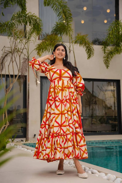Smiling woman in a vibrant red-orange-white Sajda Maxi Dress.