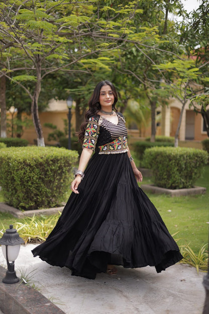 RangBhoomi Navratri Gown 2026 — Rust & Black Embroidered Multi-Tiered Festive Gown