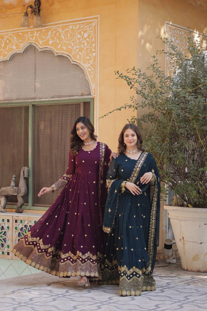 Models in teal and plum Anarkali gowns with matching dupattas.