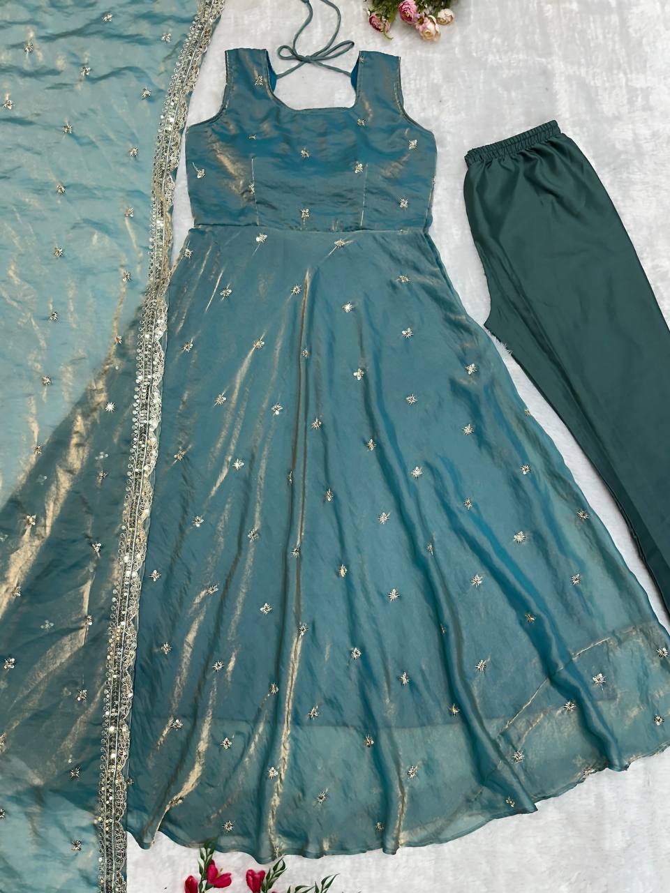 Complete teal gown ensemble with embroidered details.