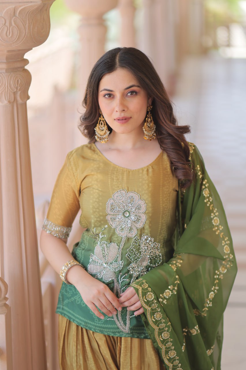 Close-up of model in Sharara Suit with detailed floral embroidery