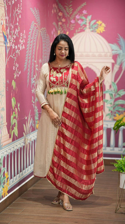 Festival Special Off-White Intricate A-Line Kurti with Flared Pants and Brick Red & Gold Striped Dupatta