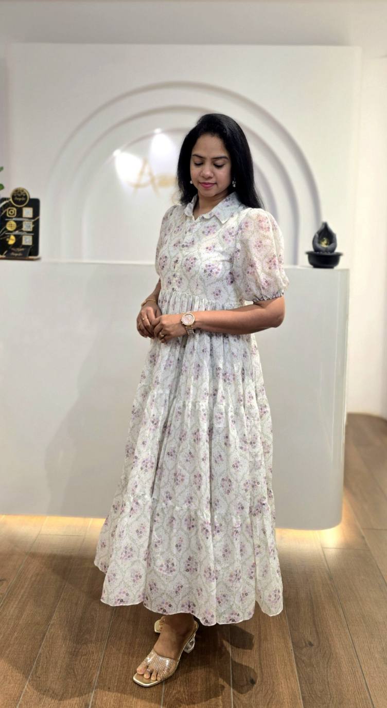 Lavender floral print maxi dress with relaxed fit and collared neckline.