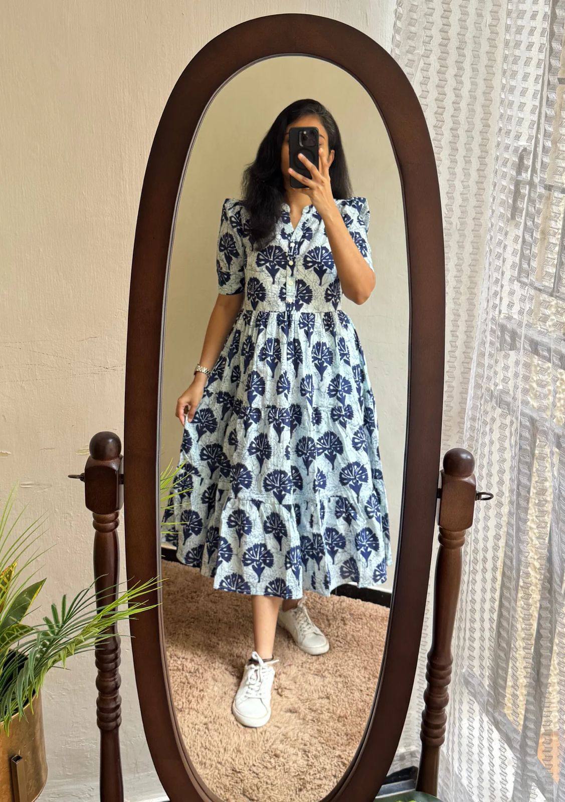 Floral cotton maxi dress with short puff sleeves and button-down V-neck.