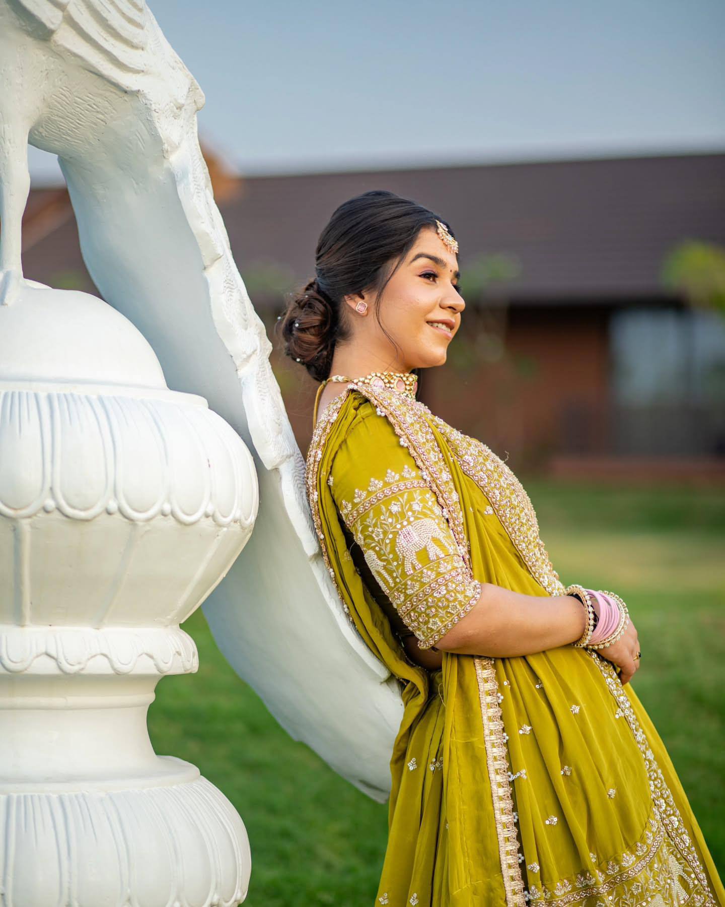 Close-up of the lime georgette lehenga choli's detailed embroidery and elephant motifs.
