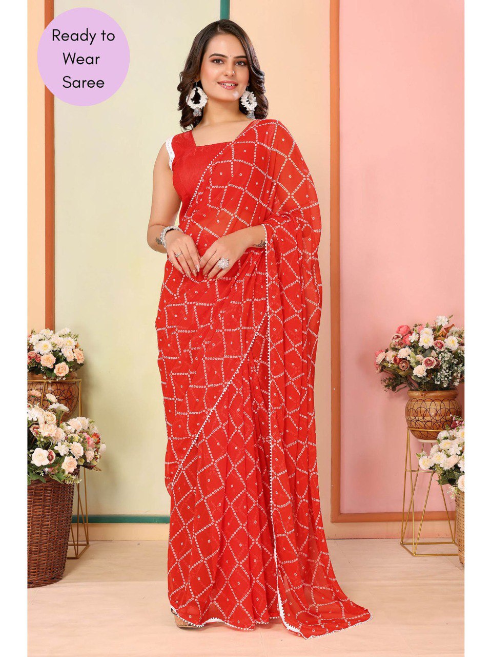 Woman in a red geometric print saree, showcasing adjustable fit and modern style.