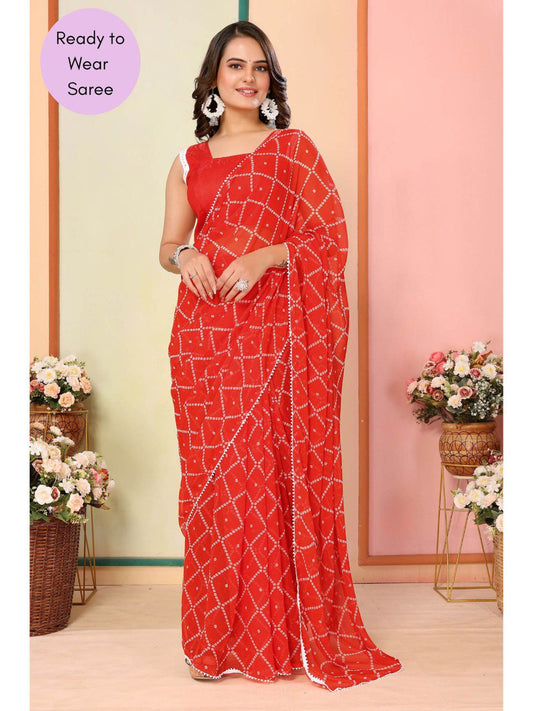 Woman in a red geometric print saree, showcasing adjustable fit and modern style.
