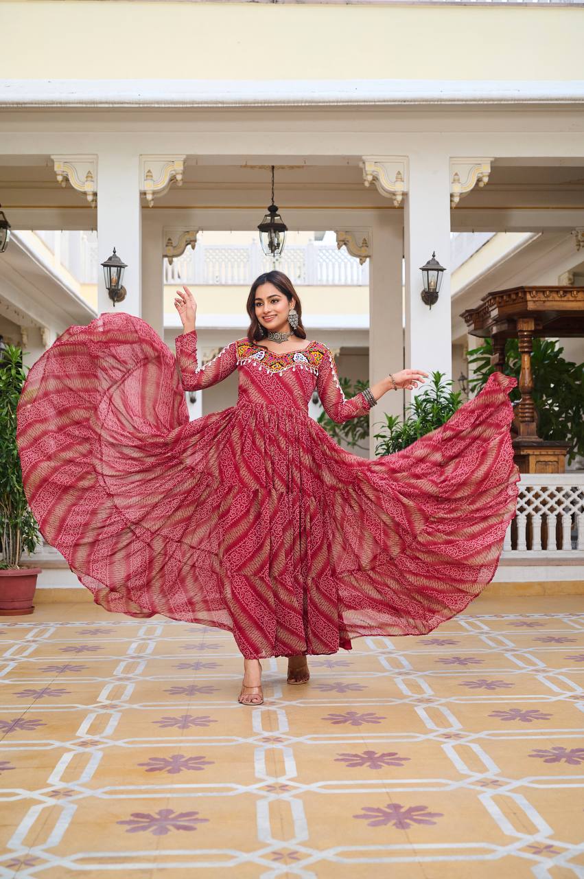 Front view of red Bandhni print gown, showing off its 9-meter flair and Gamathi handwork details.