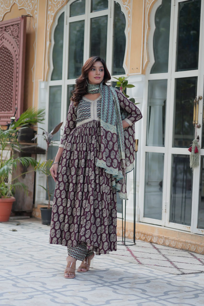 Mustard and teal cotton kurti set, chevron dupatta, block print, V-neck, Anarkali design, model twirling.