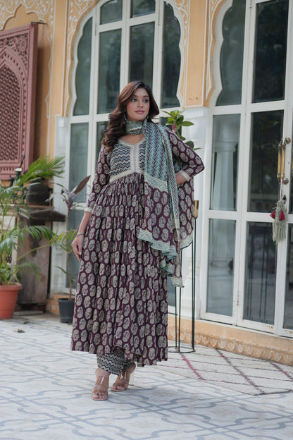 Mustard and teal cotton kurti set, chevron dupatta, block print, V-neck, Anarkali design, model twirling.