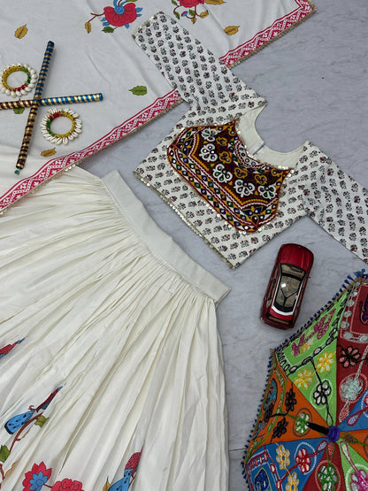 Pure cotton lehenga choli set flat lay with folk art blouse, flared skirt, and Navratri accessories.