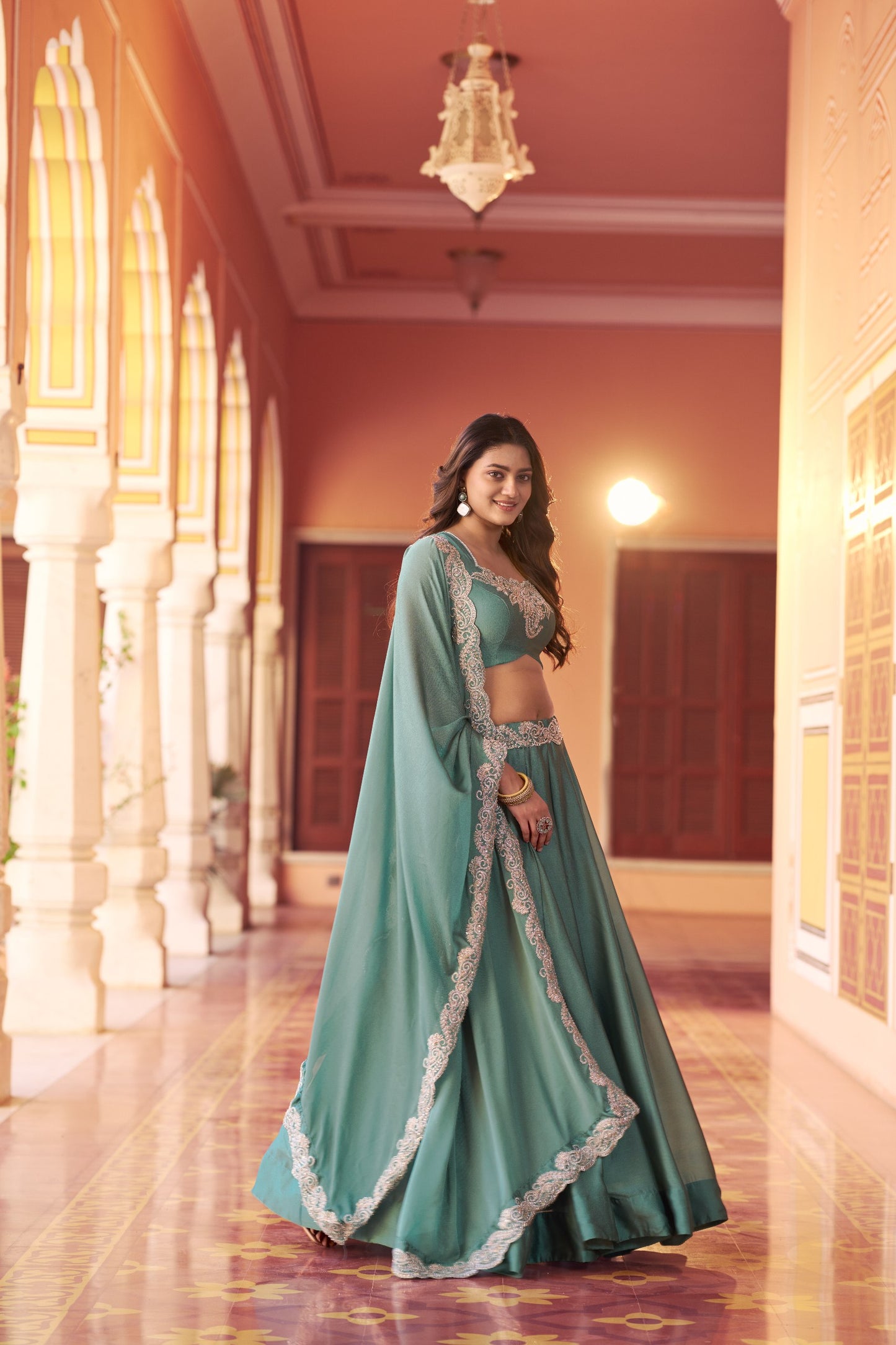 Regal Mist Designer Ensemble with Intricate Embroidery and Luxurious Rangoli Silk