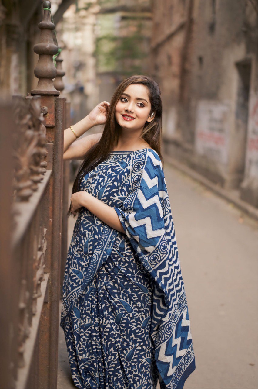 Stylish blue printed Ready to Wear Cotton Saree showcased on hanger.