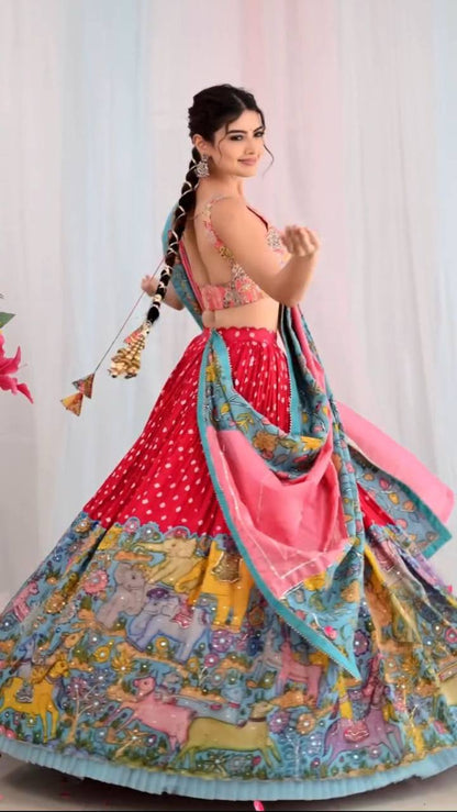 Woman in Kalamkari Lehenga Choli showcasing hand-painted design.