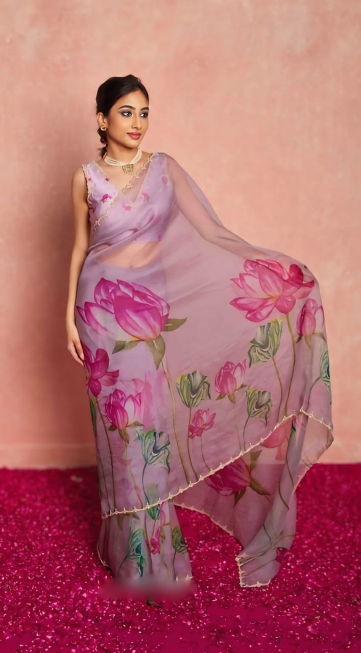 Close-up of the floral design on a ready-to-wear organza saree, scalloped edge detail.