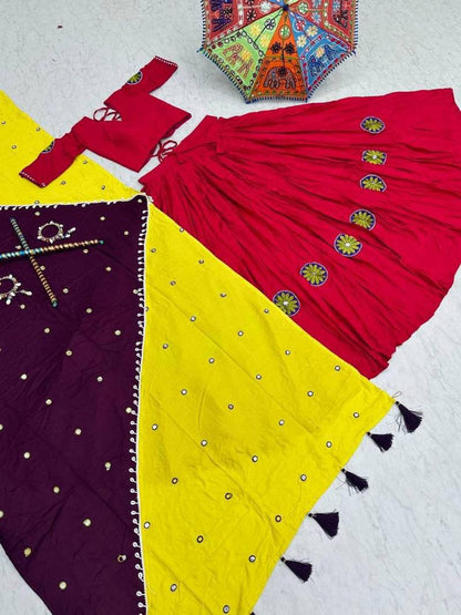 Complete Navratri set with pink lehenga, choli, yellow-purple dupatta, and colorful umbrella on white background.