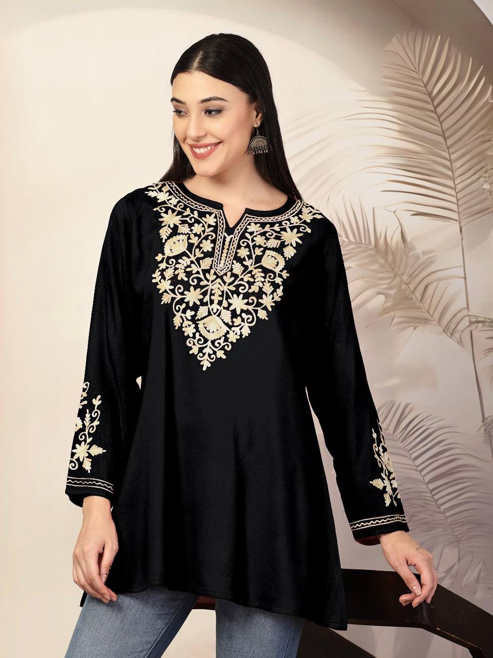 Classic black Adaa ShortKurti adorned with ornate gold embroidery and full sleeves, perfect for versatile styling.
