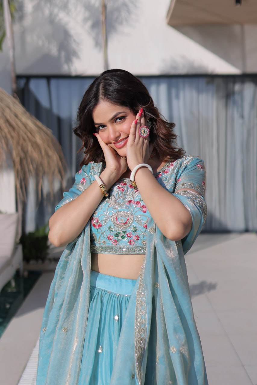 Elegant Lehenga Choli and Dupatta Ensemble in Fendi Silk with Multi-Thread Embroidery