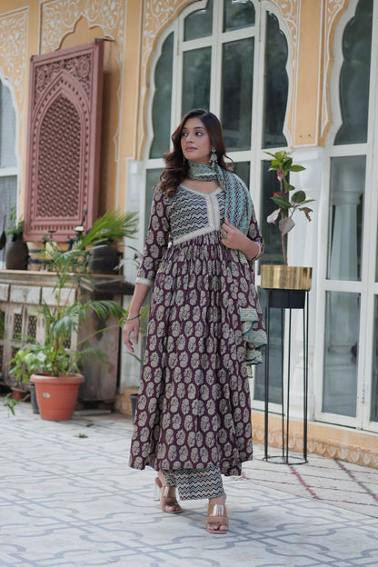 Maroon Anarkali kurti set, teal chevron dupatta, block print, full sleeves, festive ethnic styling outdoors.