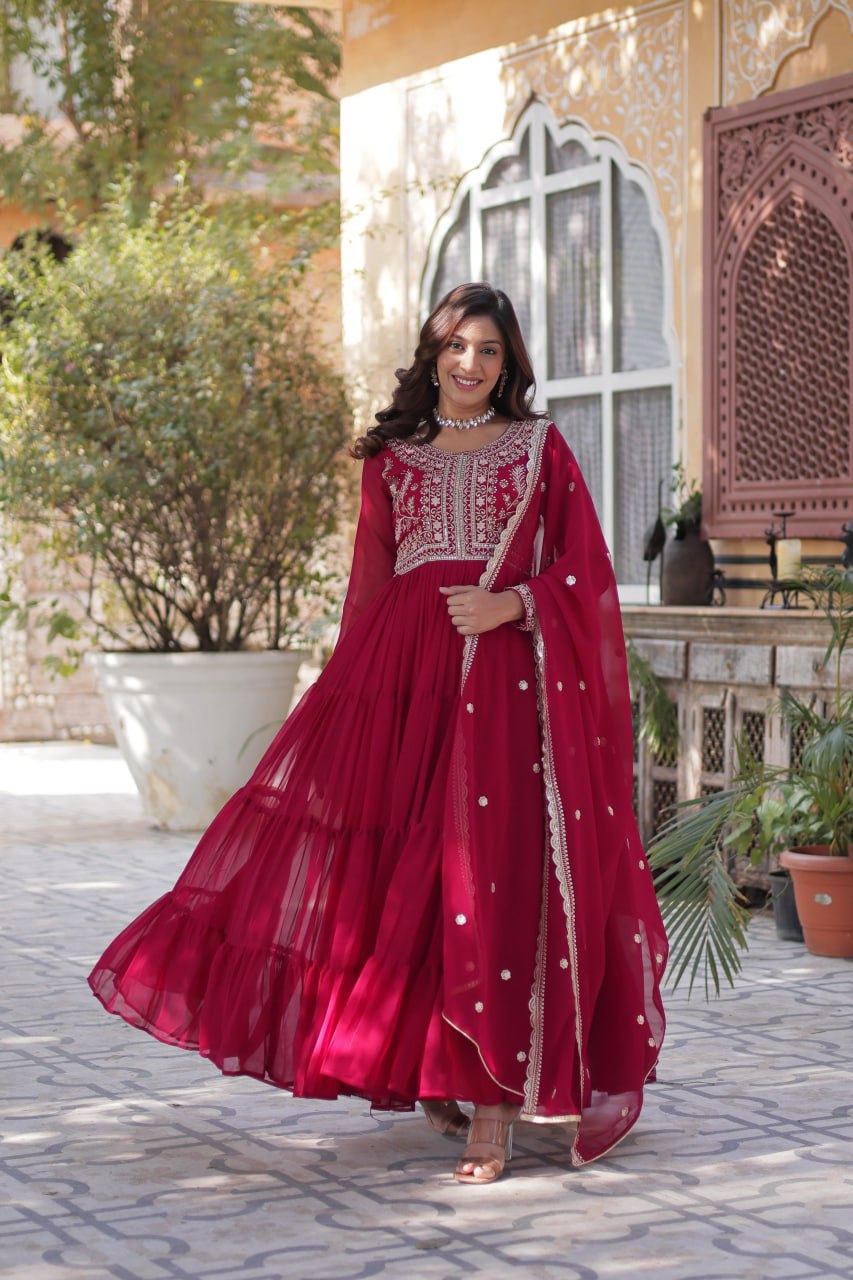 Designer red Georgette gown with intricate pearl work.