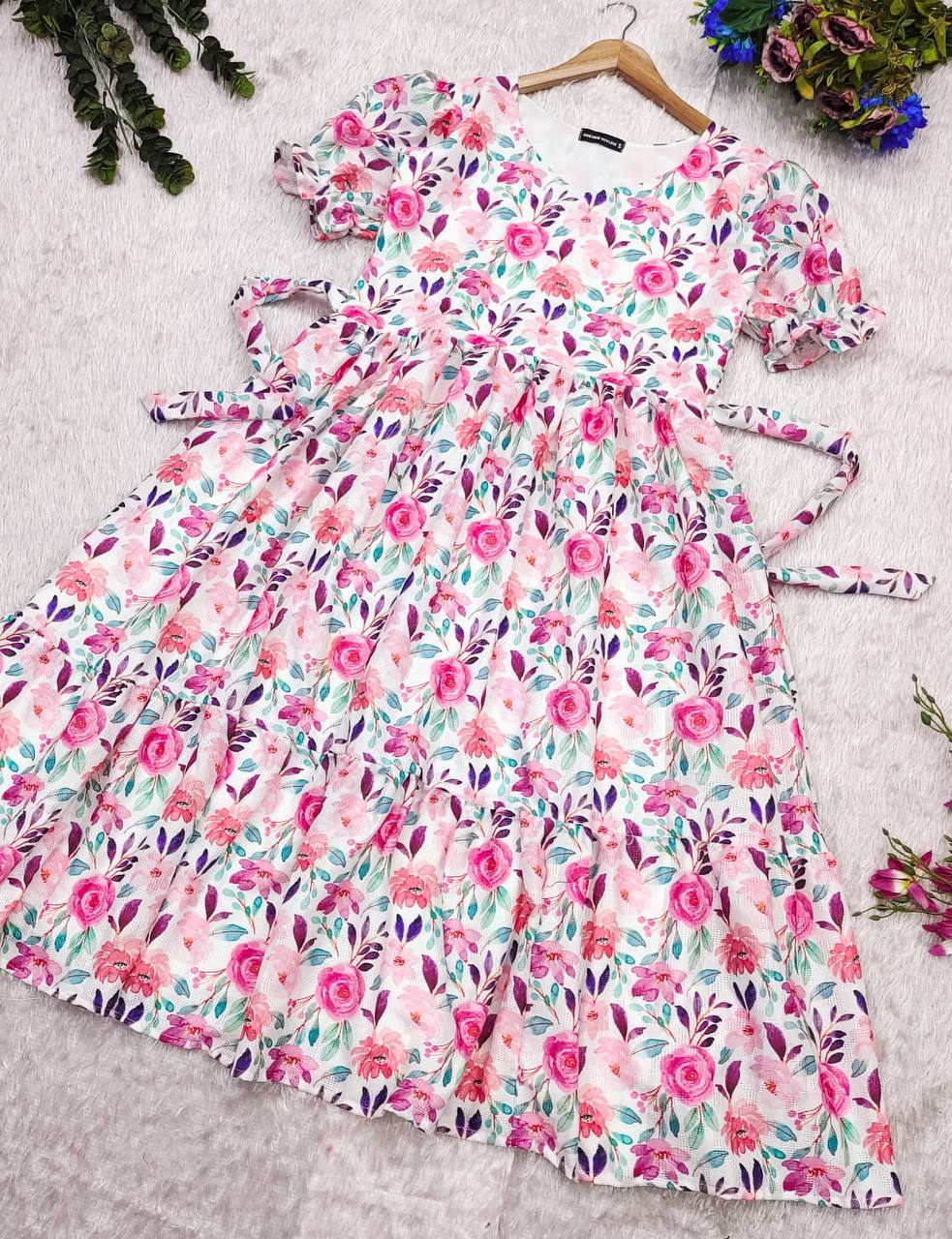 Lily Dress flat lay:  Floral maxi dress with tie details.