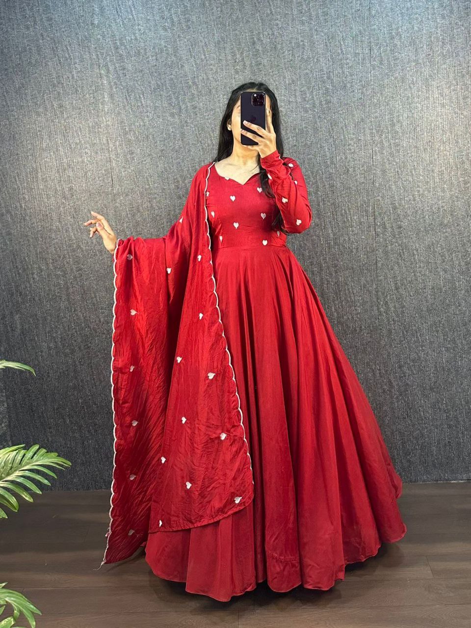 Elegant red Ajrak Heart Gown with dupatta featuring delicate heart thread work.