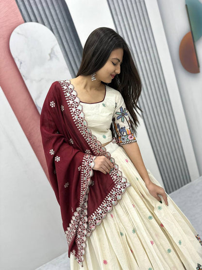 Woman in Rangbhoomi Lehenga, showcasing the maroon dupatta with delicate sequence work.