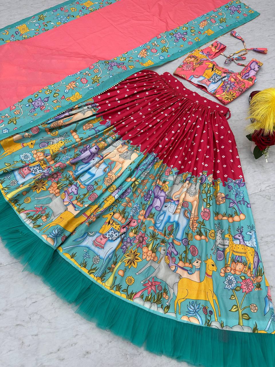 Kalamkari Lehenga Choli with intricate hand-painted design laid flat.
