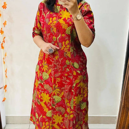 Front view of Red Forest floral cotton kurti in red with colorful leaves and yellow flowers, A-line fit.