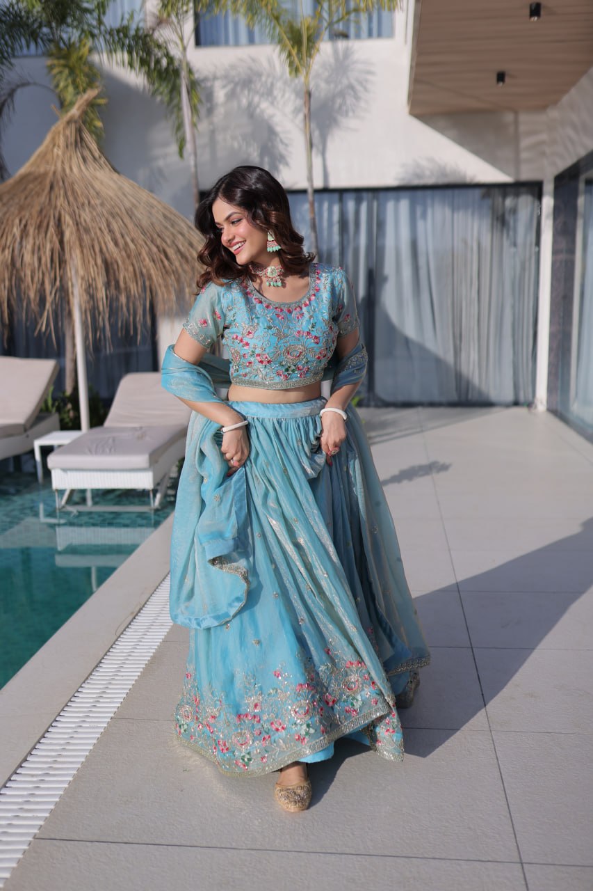 Elegant Lehenga Choli and Dupatta Ensemble in Fendi Silk with Multi-Thread Embroidery