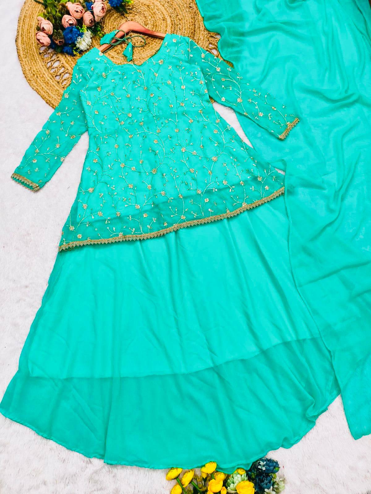 Mint green peplum top and skirt set, a three-piece formal outfit.