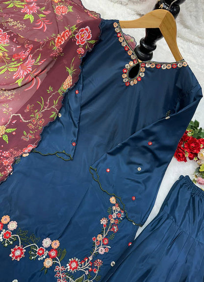 Flat lay of navy blue Farsi top with floral embroidery and maroon georgette dupatta detail.