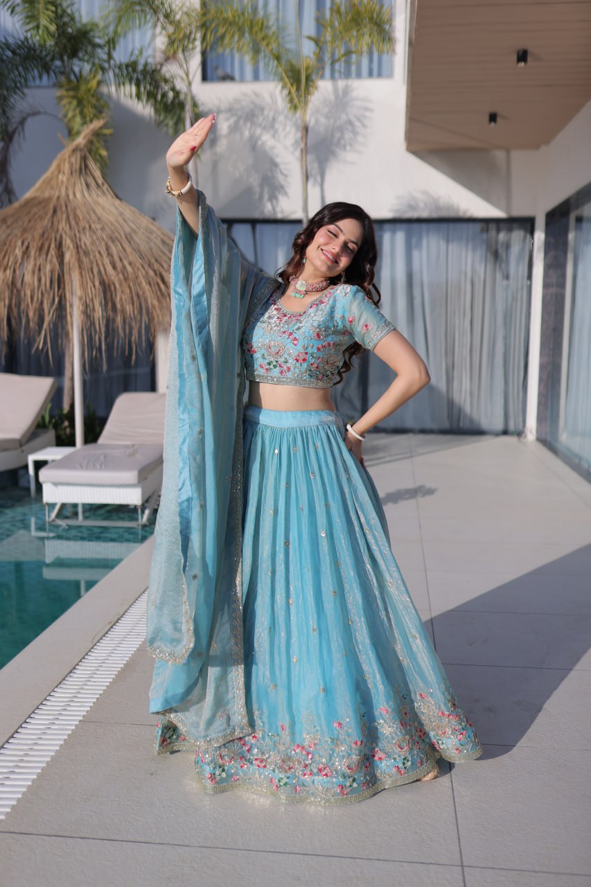 Elegant Lehenga Choli and Dupatta Ensemble in Fendi Silk with Multi-Thread Embroidery