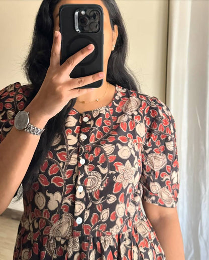 Close up detail showing the unique Kalamkari print on this maxi dress.