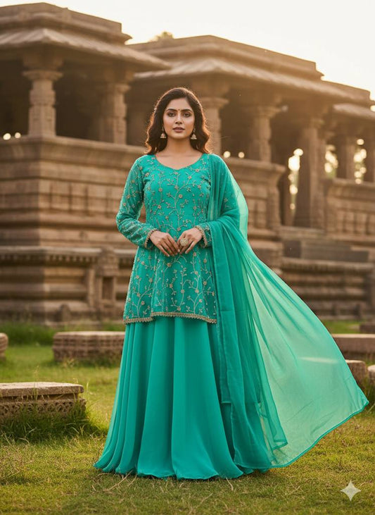 Elegant mint green peplum skirt set with dupatta for special occasions.