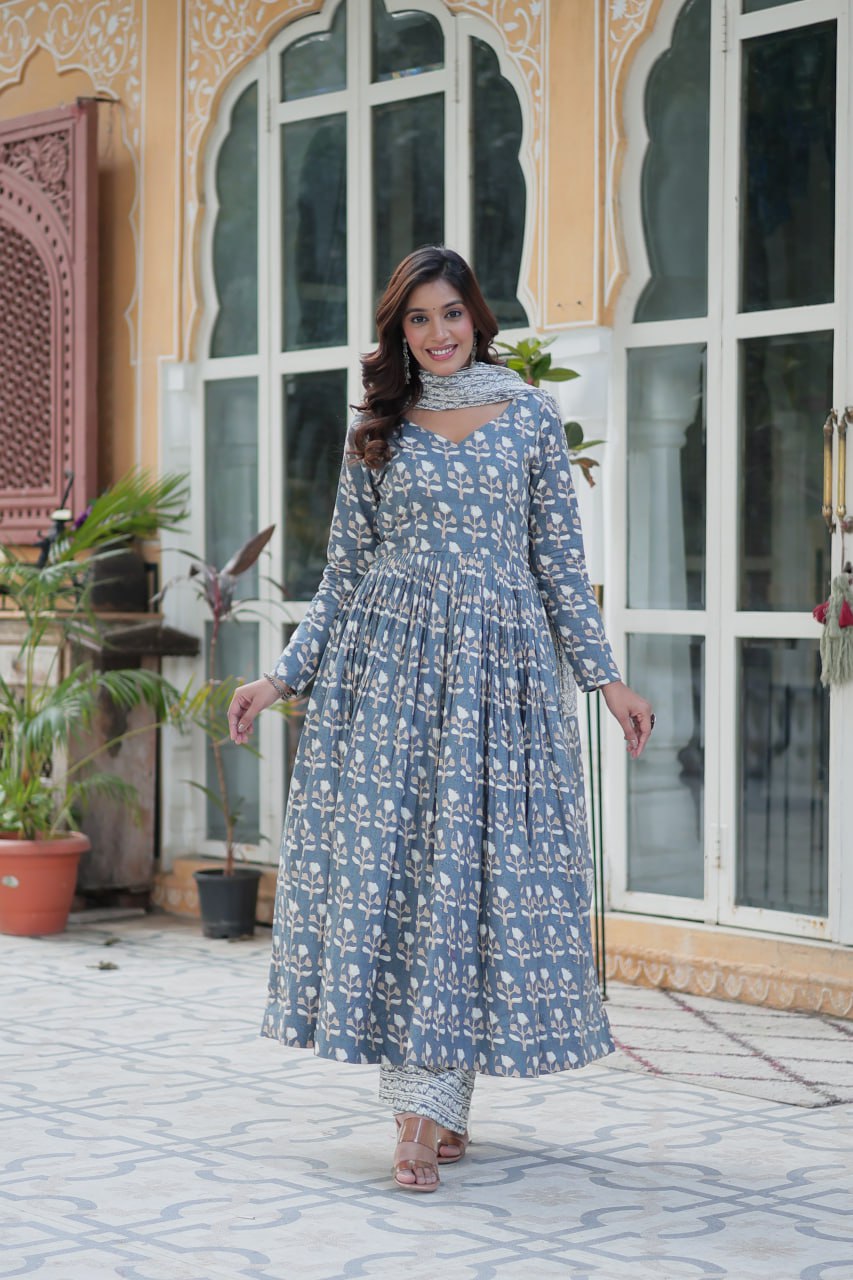 Model in a flowy blue pure cotton kurti set with full sleeves and ankle-length pants, styled for comfort.