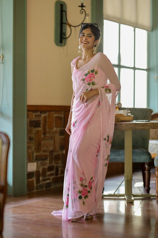 Elegant pink georgette saree with hand-painted roses, ready to wear.