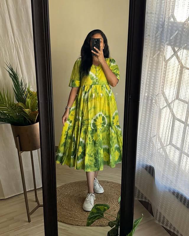 Leamonave Maxi Dress in yellow and green tie-dye, full length mirror view.