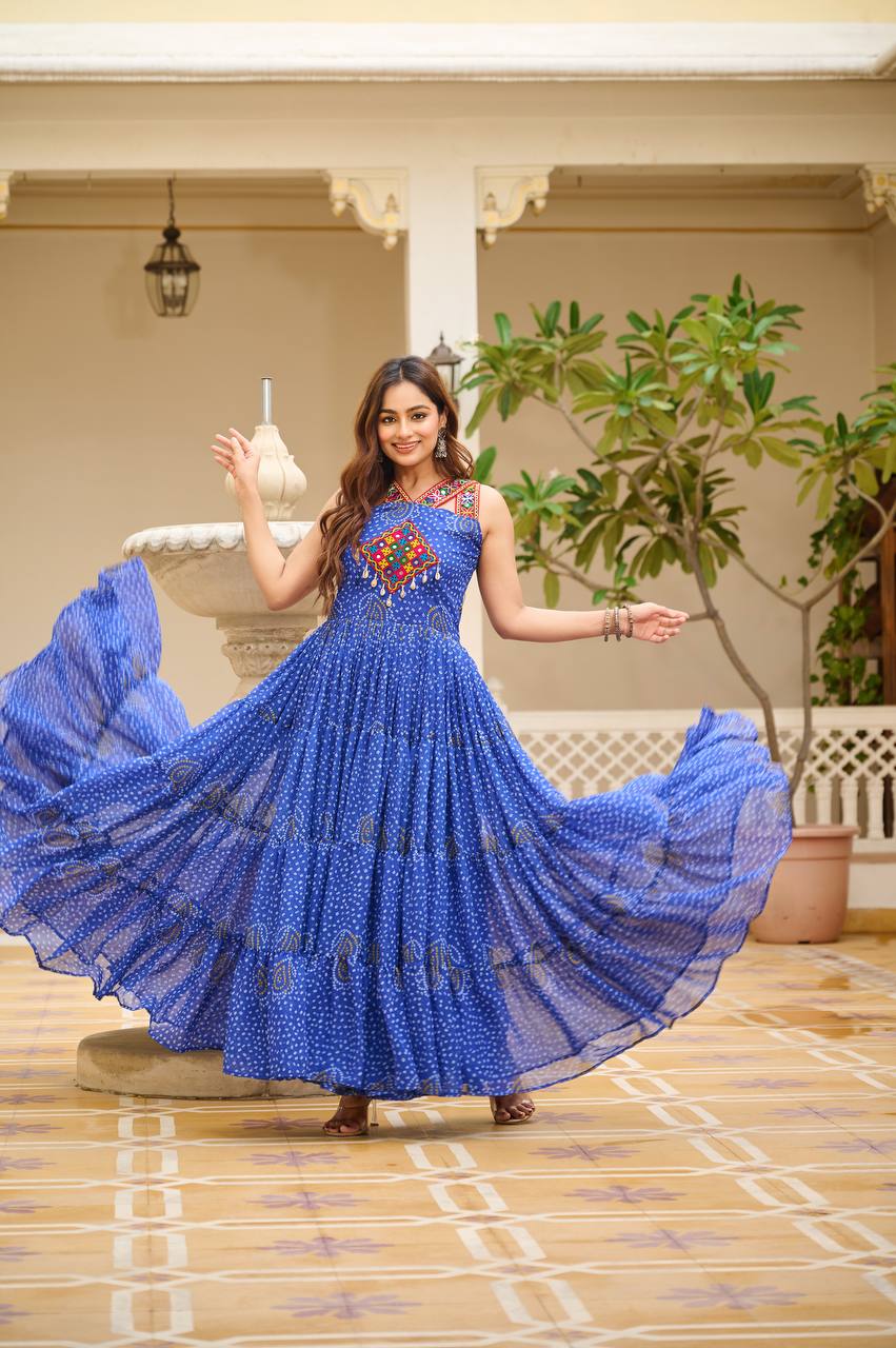Royal blue Bandhani gown with wide 12-meter flare, twirl-ready for festive celebrations.