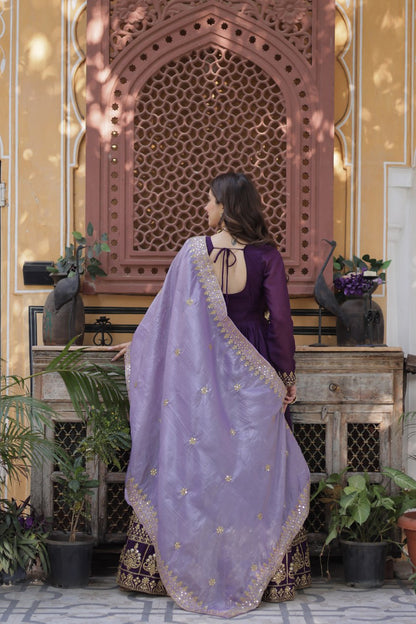 Back view of a purple gown with a gold embroidered dupatta.