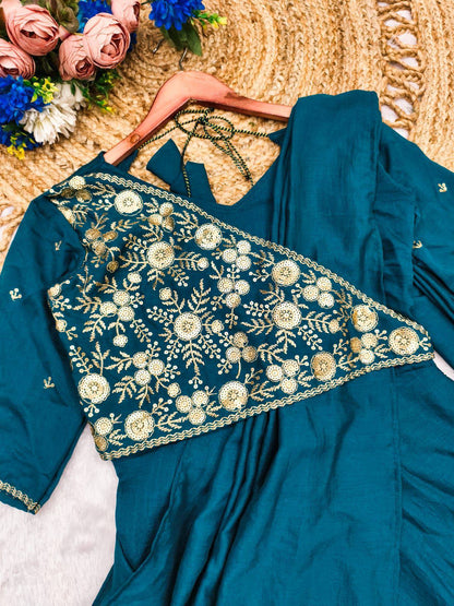 Aqua pre-draped saree-anarkali with a graceful silhouette and designer embroidered detailing.