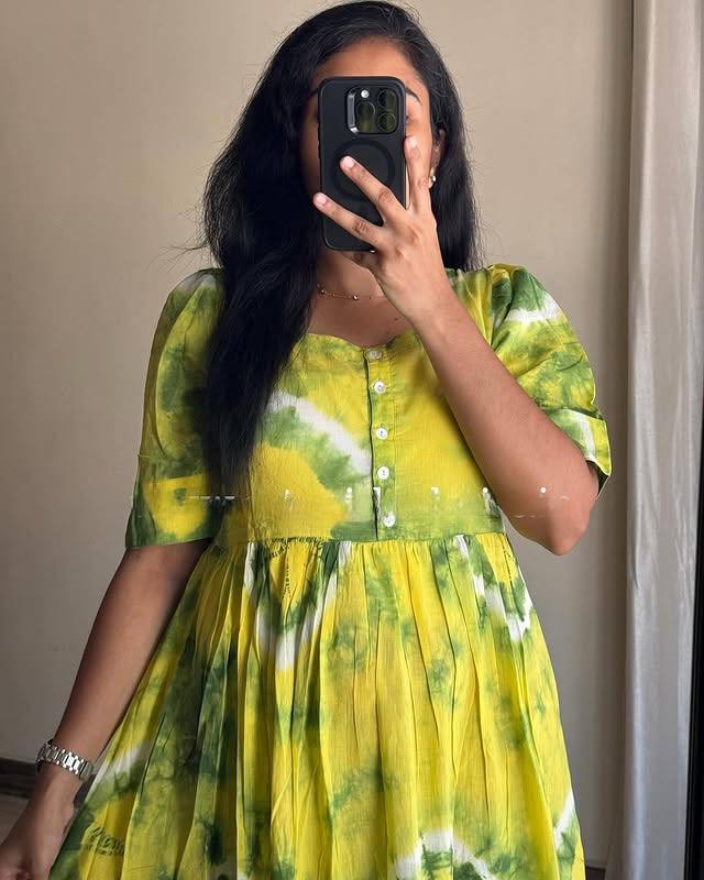 Leamonave Maxi Dress in yellow and green tie-dye with a square neckline.