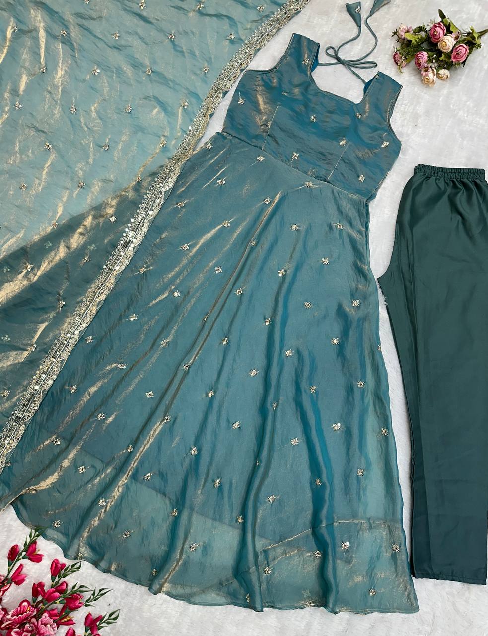 Designer party wear ensemble: Teal gown, pants, and dupatta.