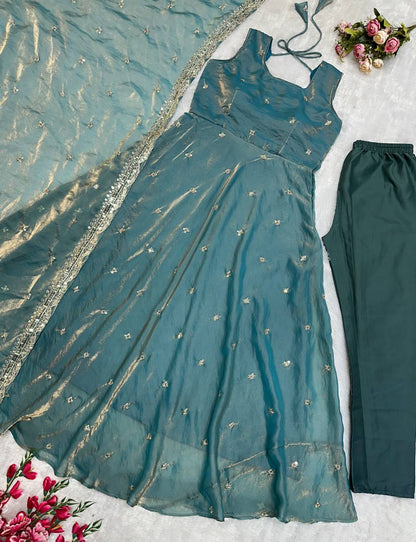 Designer party wear ensemble: Teal gown, pants, and dupatta.