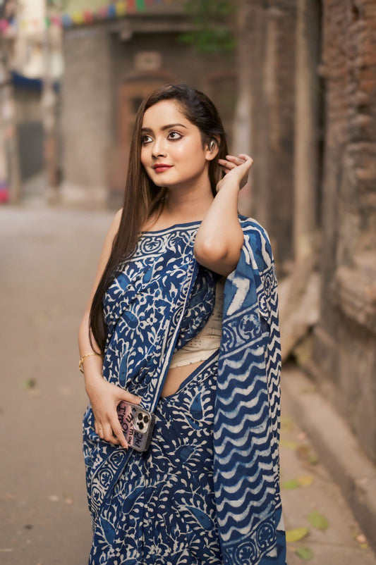 Woman in blue and white Ready to Wear Cotton Saree with a traditional block print.