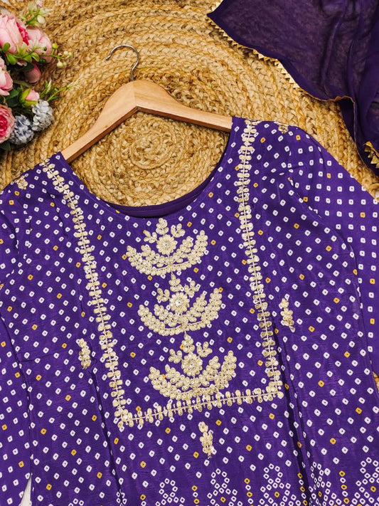 Close-up of the purple Chinon kurta with intricate Bandhani and gold embroidery.