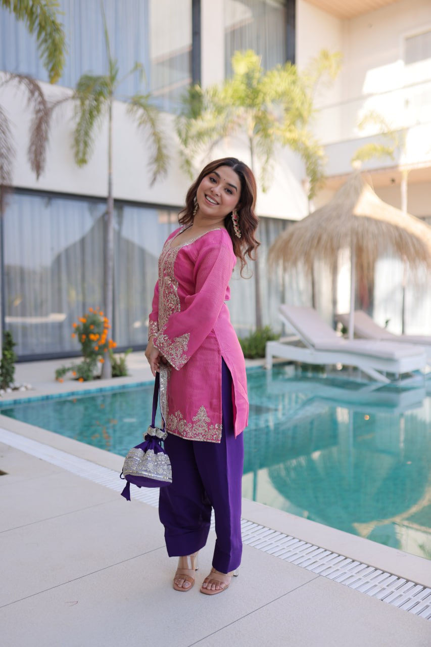 Ready-to-Wear Elegant Top with Matching Pants and Decorative Batwa Bag