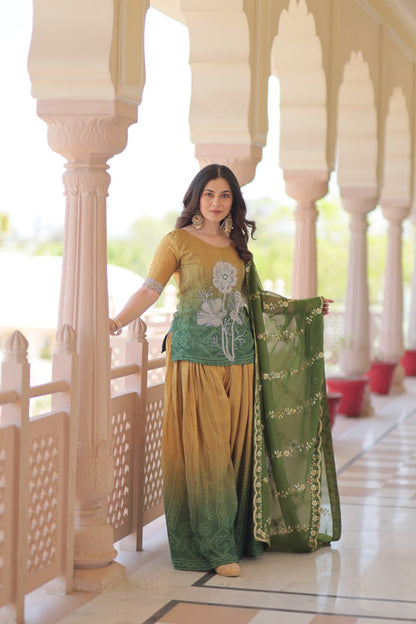 Woman in olive green Sharara Suit with zari embroidered dupatta