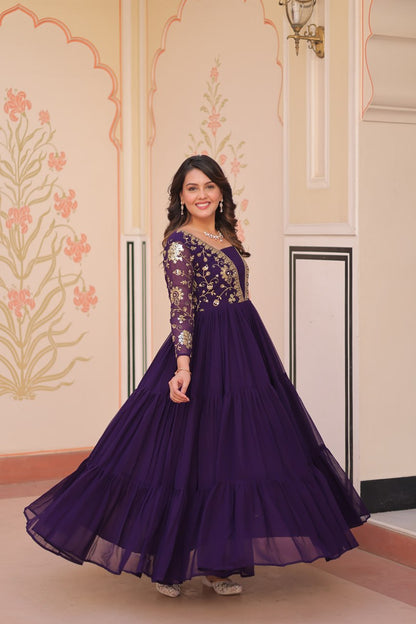 Green gown with full sleeves and layered design