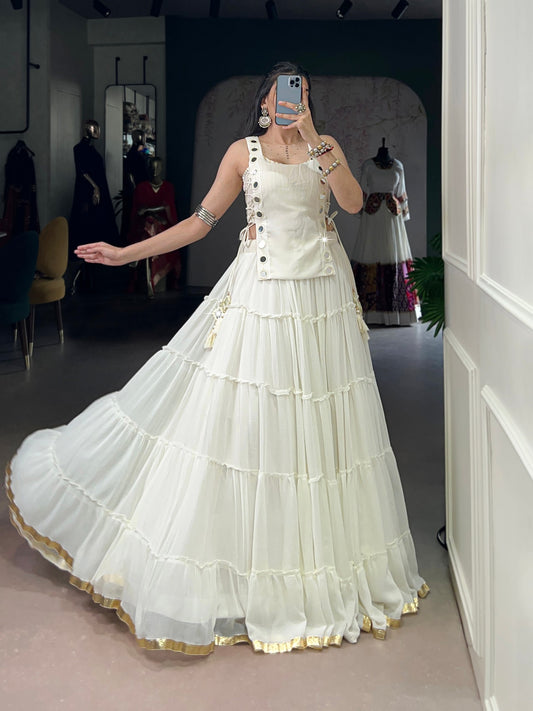 Elegant Navratri Celebration Lehenga Set Crafted from Luxurious Marble Fabric with Embossed Lace, Pure Chanderi Blouse, and Mirror-Work Koti